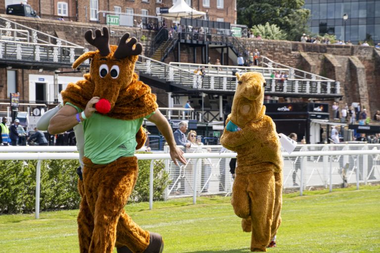 Pantomime Horse Race 2025050 close to finish Clay & C&C